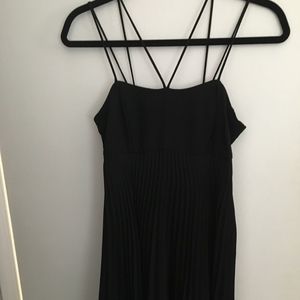 Elena and Tannassi Black Dress with Pleated Bottom